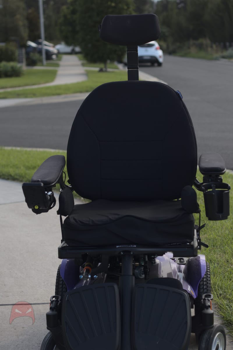 A large black electric wheelchair